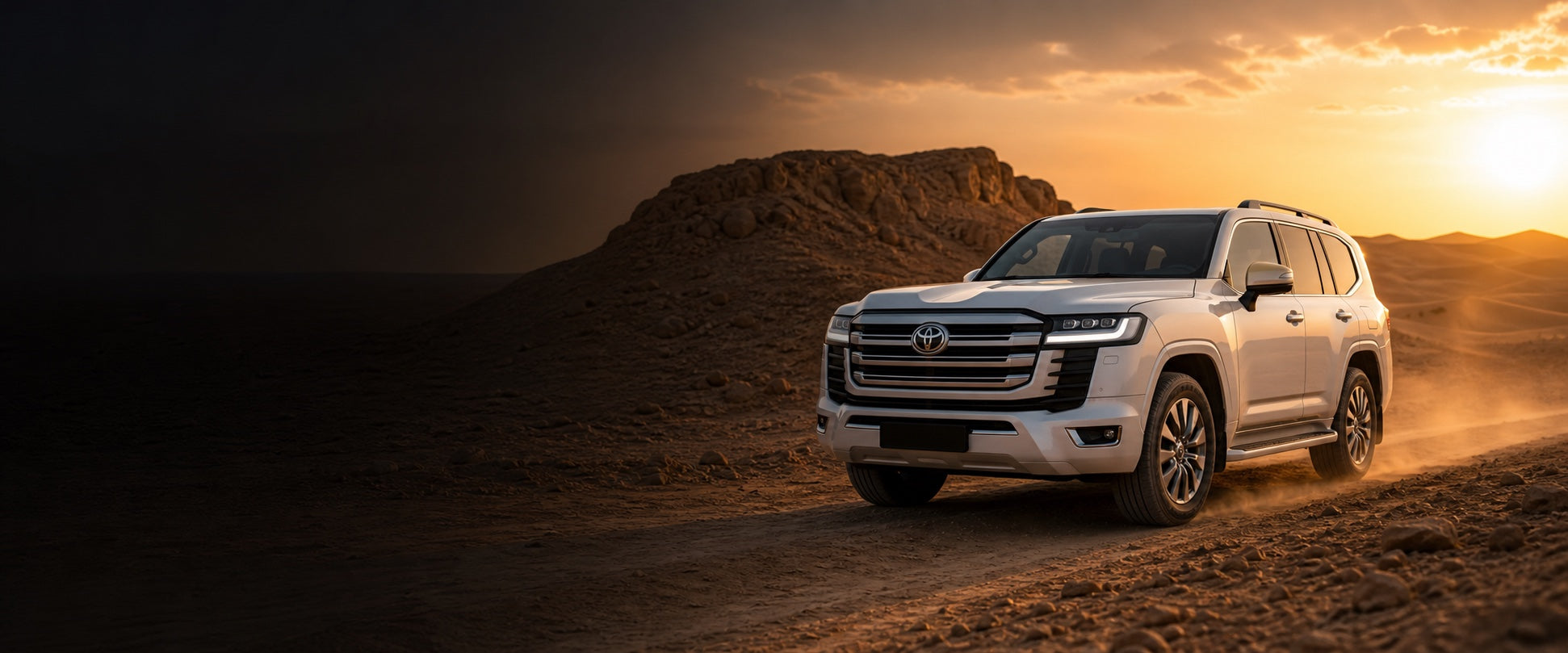 Toyota Land Cruiser in the Qatar desert at sunset
